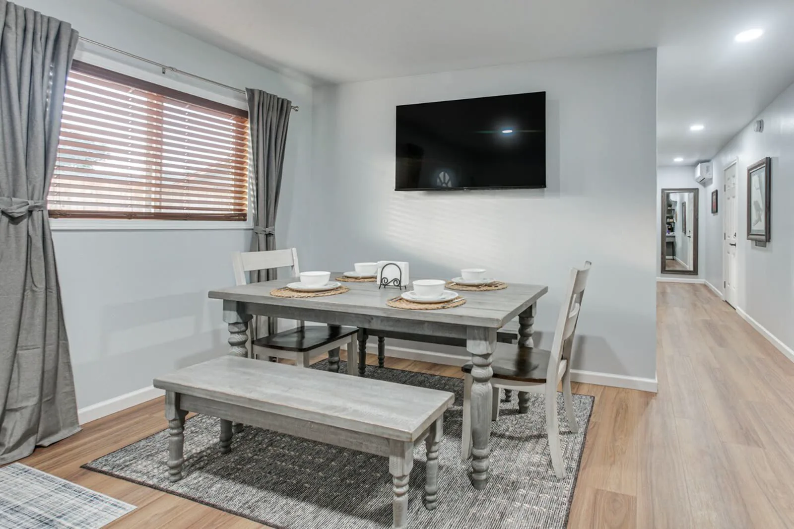 Remodeled dining area — new flooring, trim, and paint